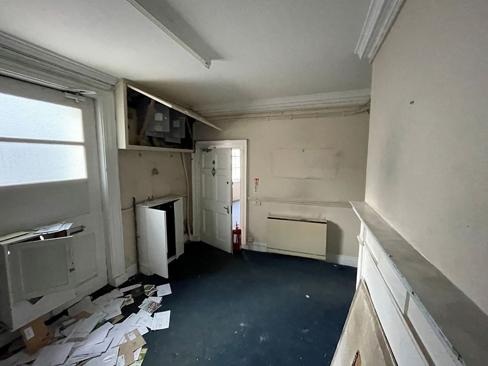 Derelict interior lobby before renovation